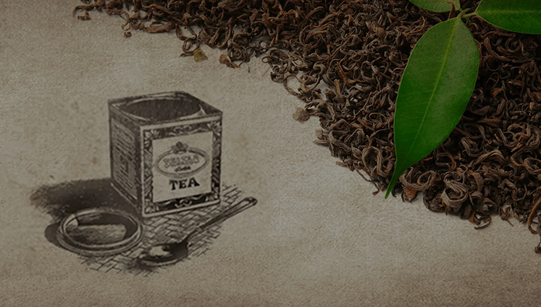 Ancienne boîte de conserve Sultan posée sur une table avec une feuille de menthe à côté